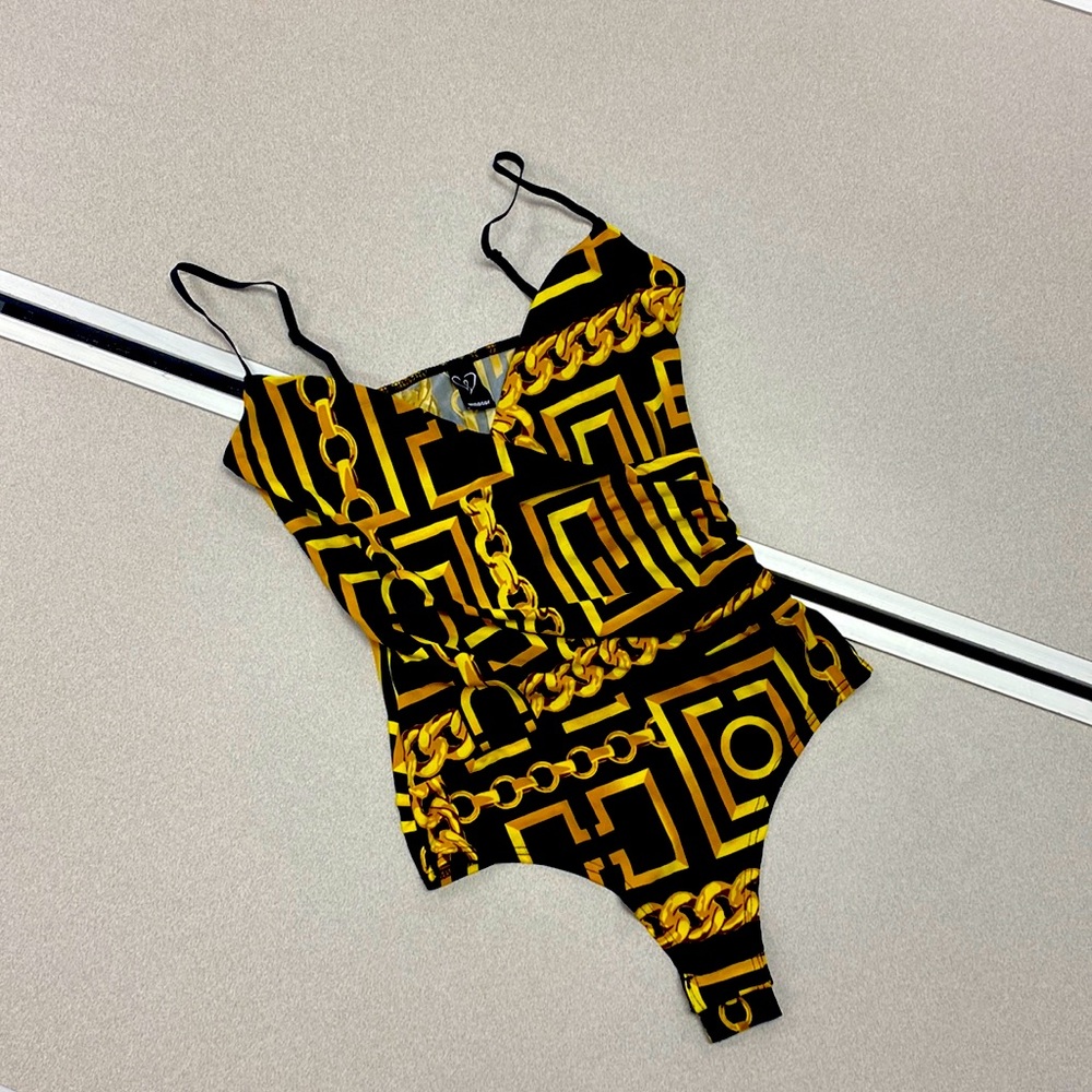 Black and gold bodysuit